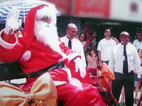 Foto de Dirceu vestido de Papai Noel