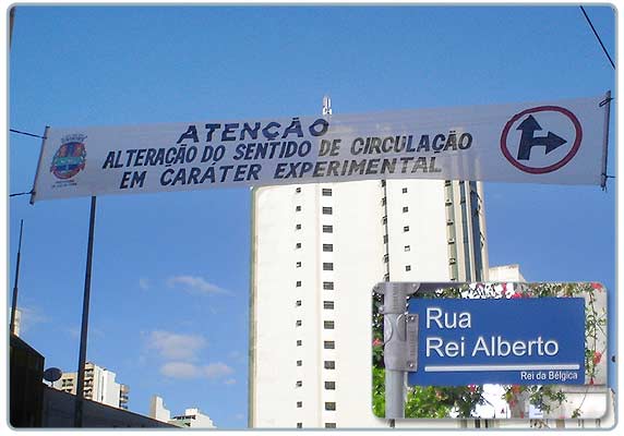 Foto montagem da placa com a faixa avisando os motoristas