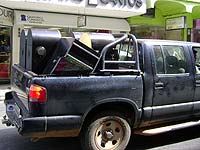 Foto das m?quinas ca?a-n?queis
no carro da Pol?cia Federal
