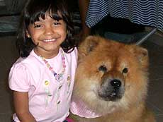 Foto de Vict?ria Osti Pedr?o com seu cachorro