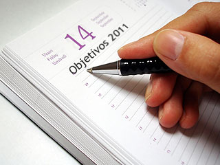 pessoa escrevendo os ojetivos para 2011