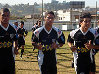 Jogadores correm durante um treinamento