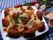 Bolinho de lingui&ccedil;a com tomate seco recheado com catupiry e fritas.